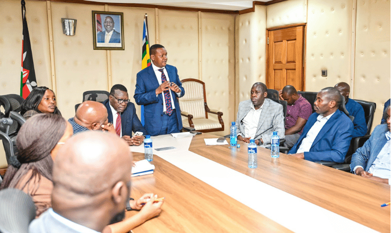 the Cabinet Secretary for Labour and Social Protection, Alfred Mutua leading the the agreement between KAWU, the Kenya Civil Aviation Authority (KCAA), the Kenya Airports Authority (KAA) and Jambojet Limited.