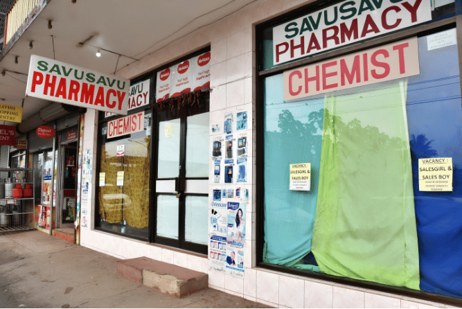 Storefront of Savusavu Pharmacy and chemist shop with signage and product advertisements on display windows. Chemistry are among those warned to be alert with the fake eye injection.
