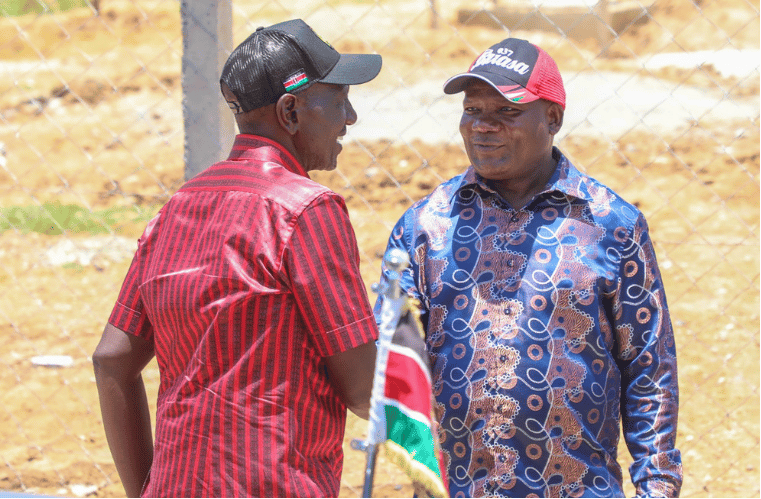President William Ruto (left) shares a light moment with Kakamega Governor Fernandes Barasa during a development inspection tour in Kakamega County.