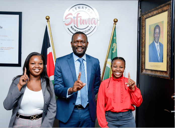 Edwin Sifuna and youth activists show voter registration signs after meeting Allan Ademba and team
