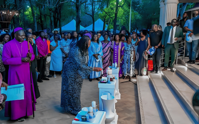 Mama Ida Odinga accompanied by religious leaders and family lights a memorial candle during a solemn vigil honoring the late former Prime Minister Raila Odinga.